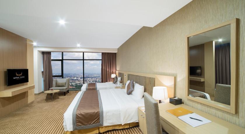 Image of Deluxe Triple - 1 Double Bed and 1 Single Bed 0