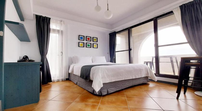 Image of Sea View Quadruple Room with Balcony 0