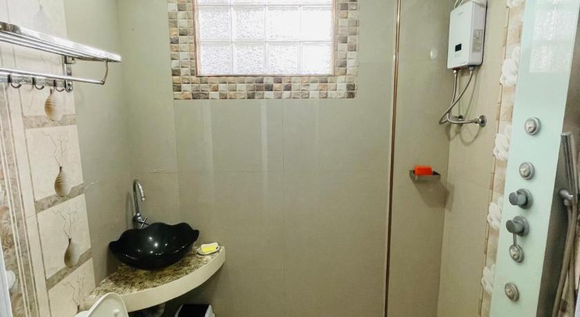 RESTHOUSE fully airconditioned w/ Private Parking photo