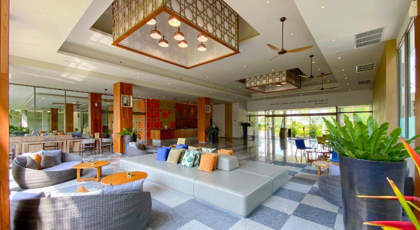 a living room filled with lots of furniture, X10 Khaolak Resort (SHA Plus+) in Khao Lak