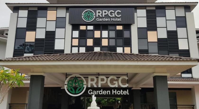 a large building with a clock on the front of it, RPGC Garden Hotel in Ipoh