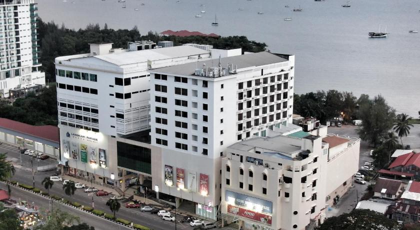 a large building with a lot of windows on top of it, Hotel Langkasuka in Langkawi