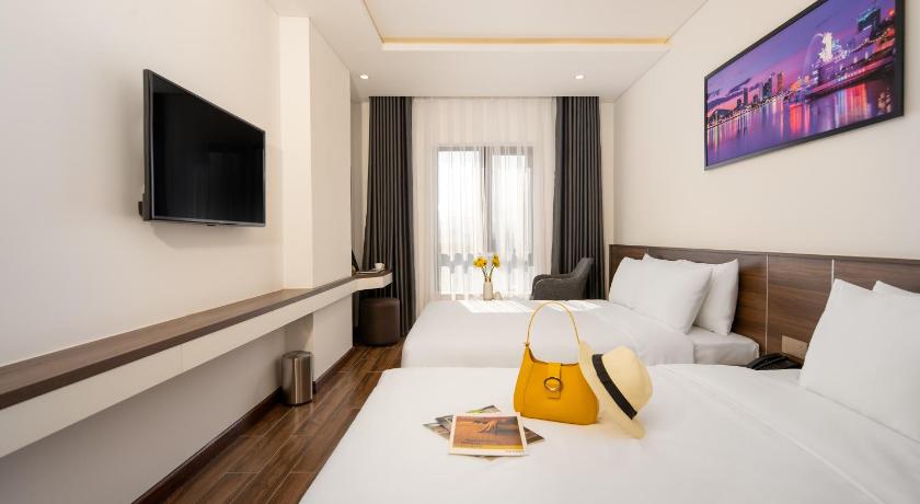 Image of Deluxe Triple Room 0