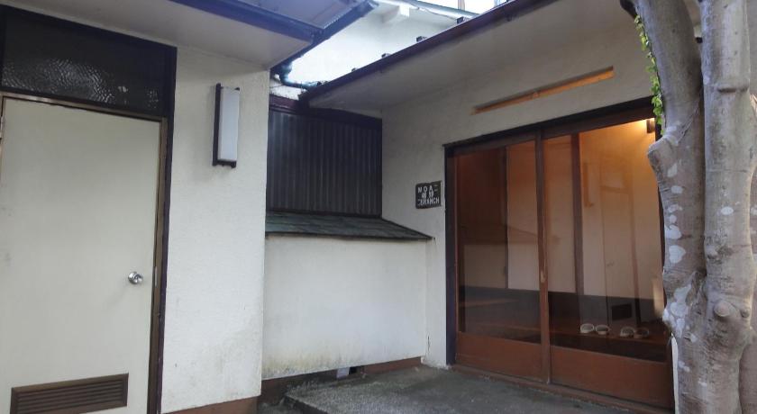 a kitchen with a door open and a door open, Kinreisou in Hakone
