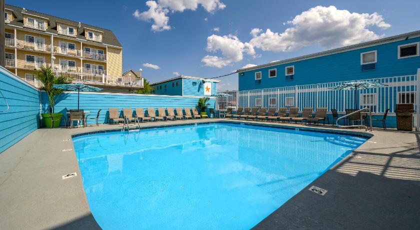 a swimming pool with blue walls and blue floors, South Beach Apartment in Ocean City (MD)