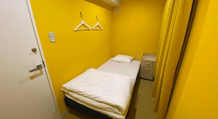 Image of Single Room with Shared Shower and Toilet 0