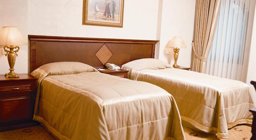 صورة غرفة قياسية ثلاثية (Standard Triple Room) 0