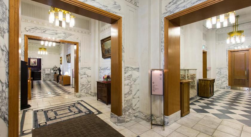 a bathroom with a large mirror, sink, and walk-in shower, Hotel Monterey Edelhof Sapporo in Sapporo