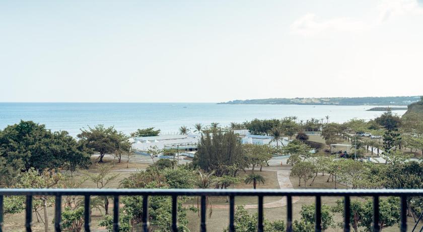 a view from a balcony overlooking the ocean, Daban Six Guest House in Kenting