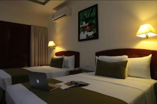 Image of Double Room with Two Double Beds 0