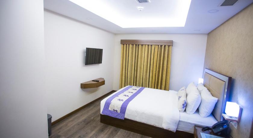 Foto Kamar Premium Quadruple (Premium Quadruple Room) 1