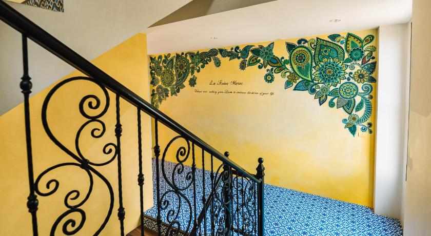 a wall with a blue wall and a blue wall with a blue wall, La Reina Maroc Hotel in Khao Yai