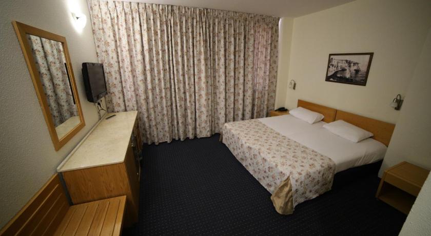 صورة غرفة اقتصادية ثلاثية (Economy Triple Room) 0