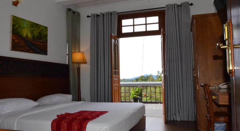 Image of Deluxe Room with Balcony 0