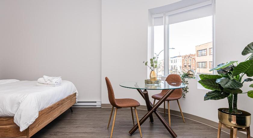 Huge New Flat well Located closed on St-Denis Street by Den Stays photo
