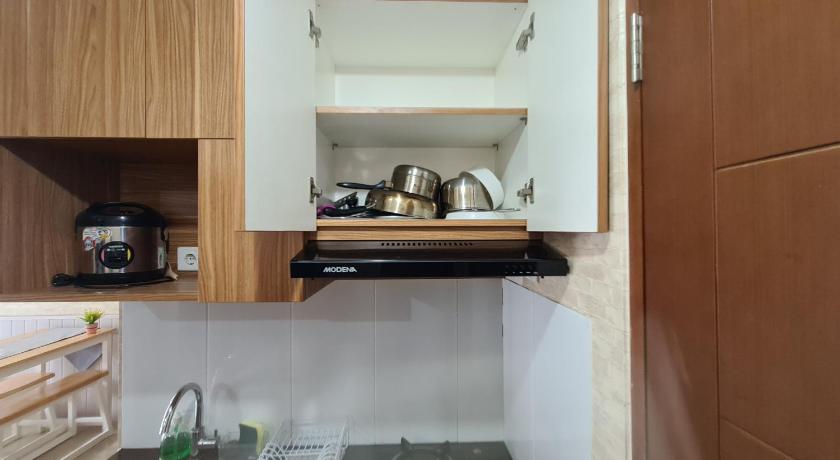 a kitchen with a sink, stove and cabinets, Gateway Pasteur 2BR tower depan Ruby 7 C in Bandung