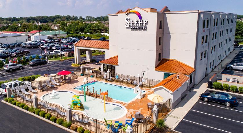 a large building with a lot of umbrellas on top of it, Sleep Inn & Suites Rehoboth Beach in Aspen Meadows (DE)