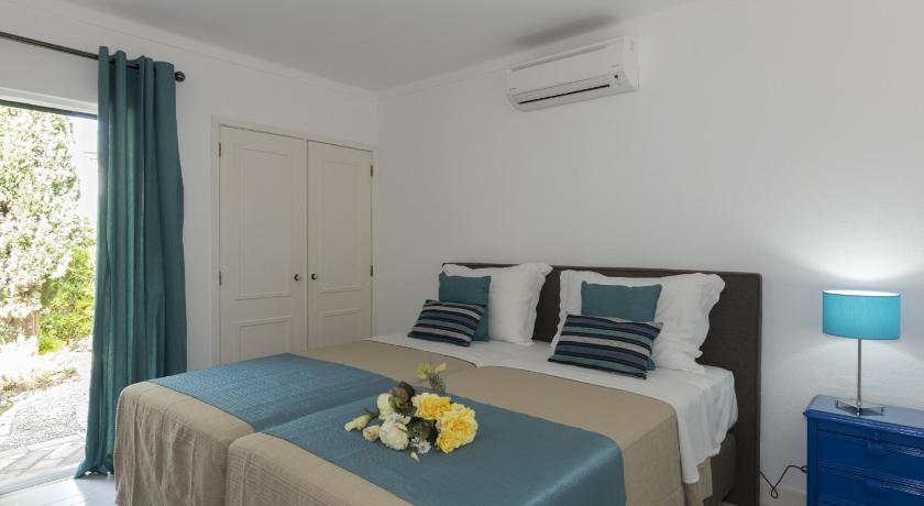 รูปของวิลลาแบบสามห้องนอนพร้อมสระว่ายน้ำส่วนตัว (Three-Bedroom Villa with Private Pool) 0