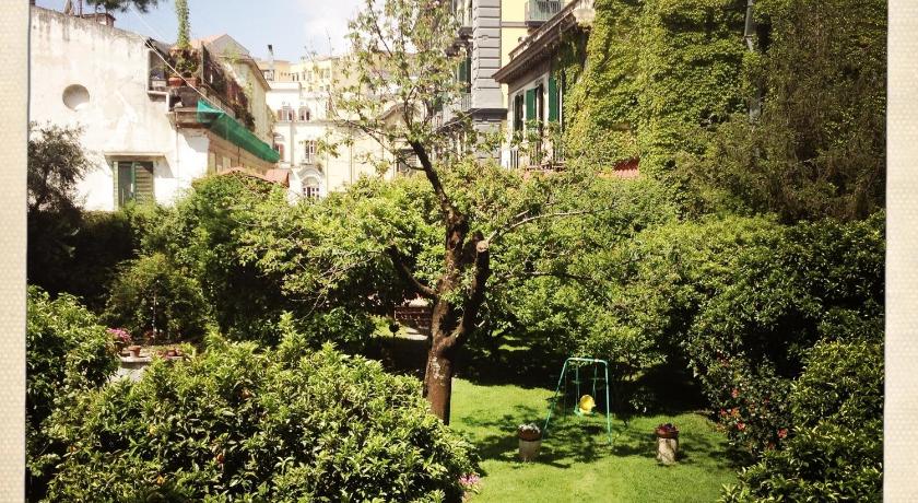 Image of Double Room with Balcony and Garden View 12