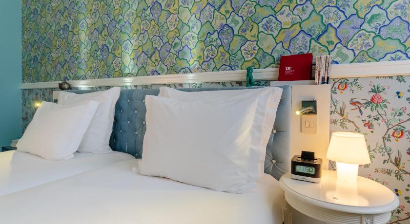 รูปของห้องดีลักซ์เตียงใหญ่พร้อมวิวเมือง (Deluxe Double Room with City View) 10