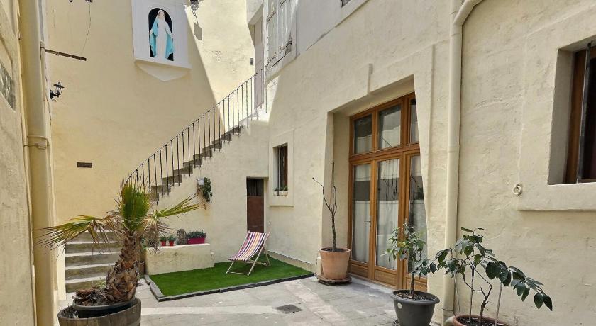 Des appartements au calme dans un immeuble historique — Hotel in Beziers