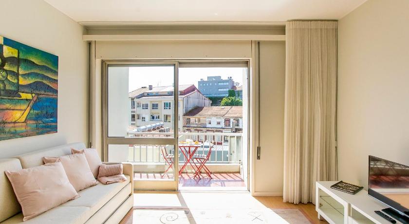 3BR Apartment with Balcony and Free Parking by LovelyStay photo