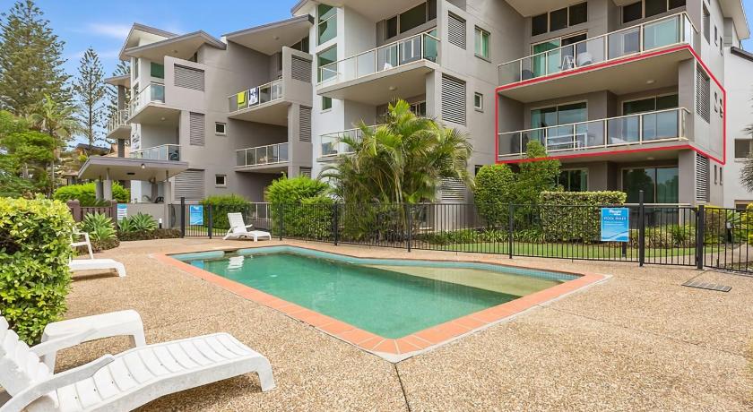 Beach Bliss Luxurious Apartment with Pool photo
