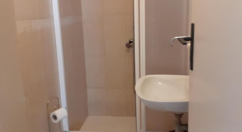 Image of Triple Room with Private Bathroom 2