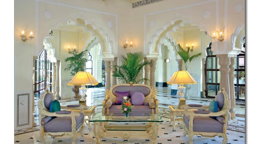 a living room filled with lots of furniture, The Shiv Vilas Resort in Jaipur
