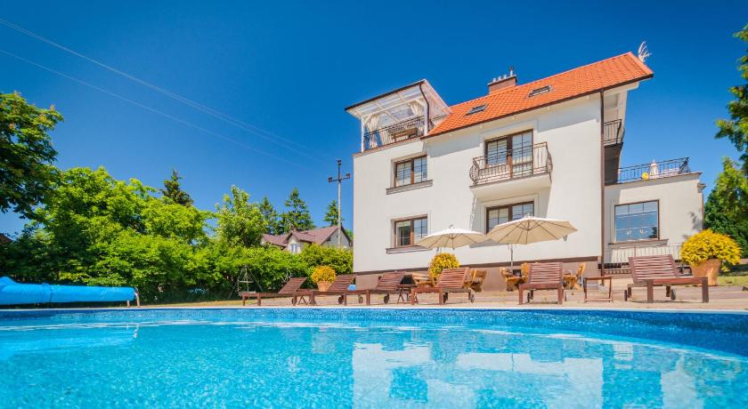 Bryza Jantar apartamenty z sauna & domki z kominkami