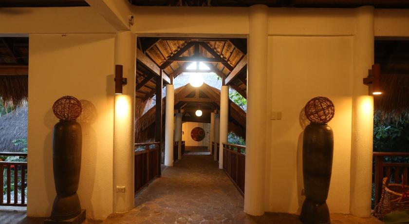 two people standing in front of a door, Amun Ini Beach Resort & Spa in Bohol