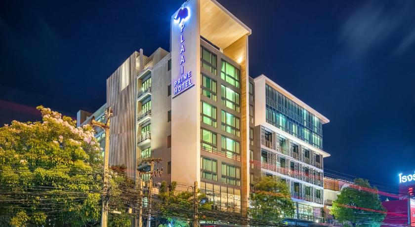 a large building with a clock on the side of it, PLAAI Prime Hotel Rayong (Formerly D Varee Diva Central Rayong) (SHA Extra Plus) in Rayong
