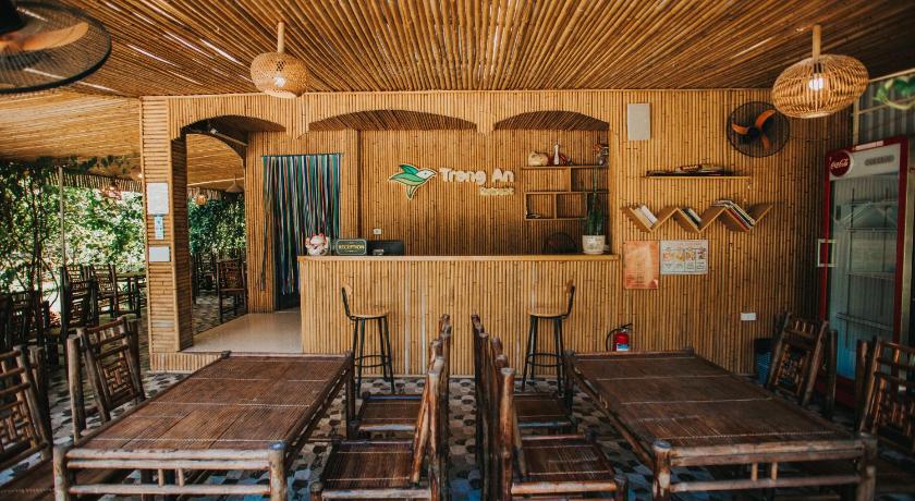 a dining room with wooden tables and chairs, Trang An Retreat in Ninh Bình