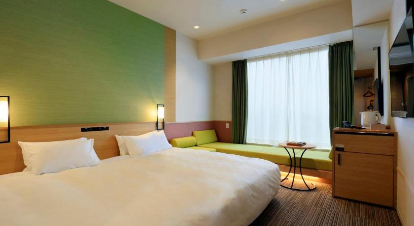 a hotel room with two beds and two lamps, Candeo Hotels Nara Kashihara in Asuka