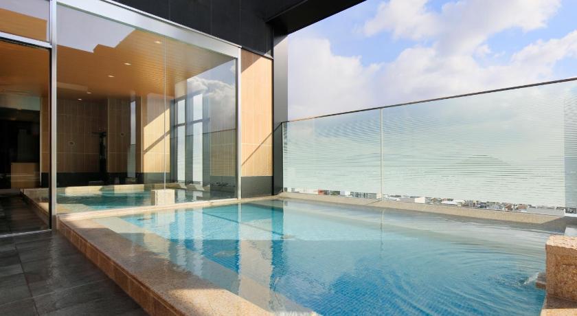 a large swimming pool with a large window, Candeo Hotels Nara Kashihara in Asuka