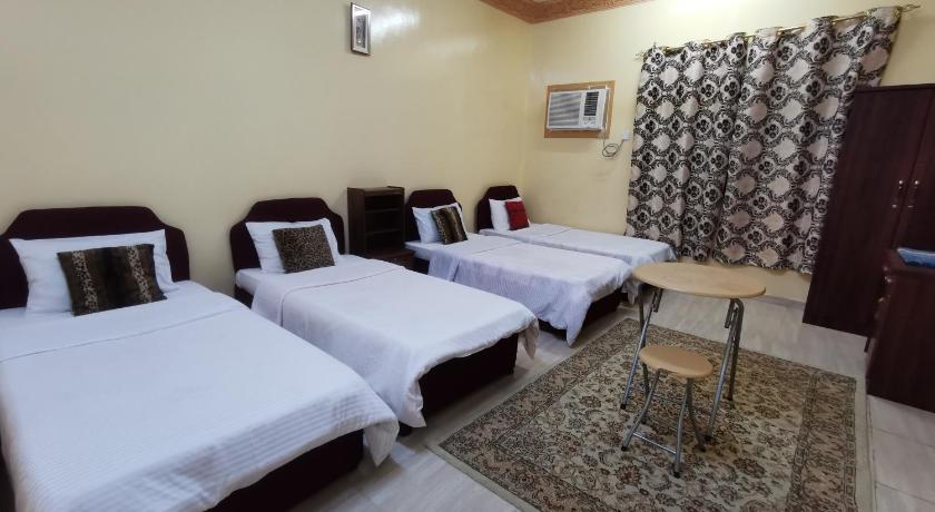 Image of Quadruple Room with Garden View 0