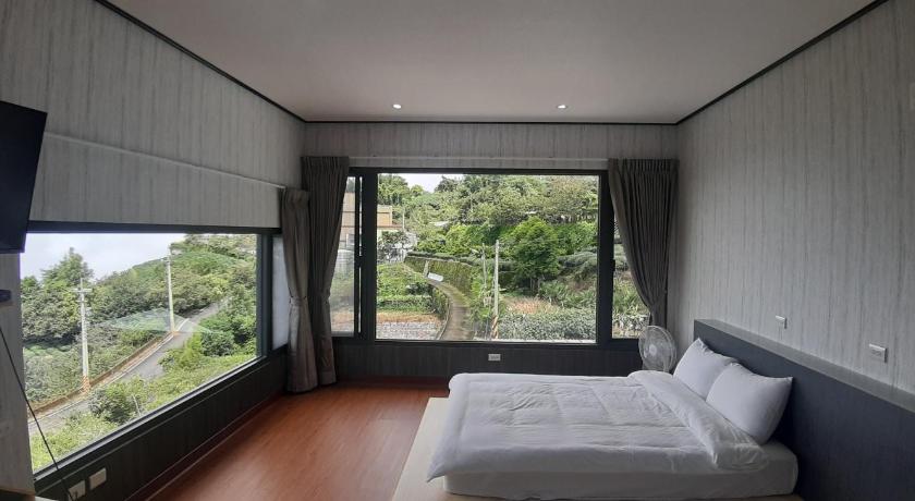 Image of Quadruple Room with Garden View 0