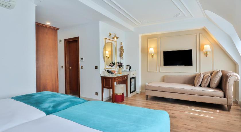 Image of Habitación Triple Superior (Superior Triple Room) 0