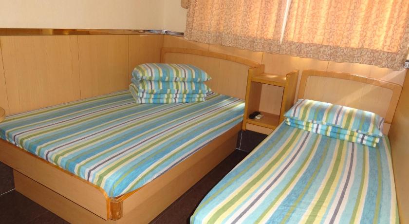 Image of Triple Room with City View 10