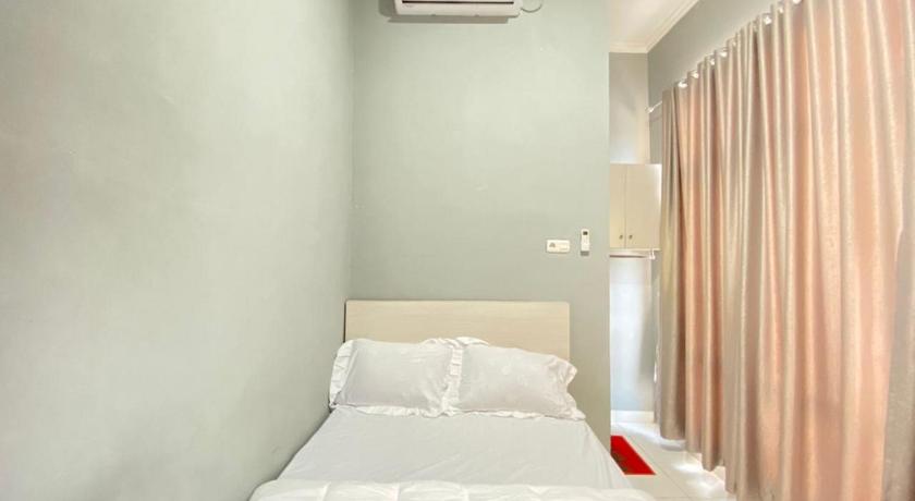 Pelangi Guest House Palembang by RedDoorz