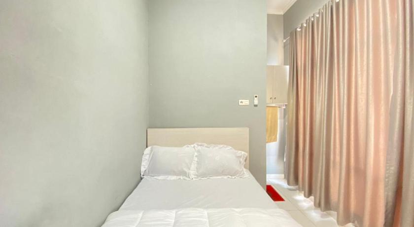 Pelangi Guest House Palembang by RedDoorz