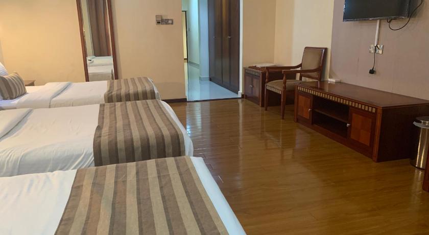 Image of Deluxe Triple Room 0