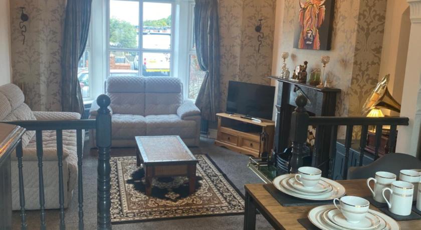 Quigley Buildings - Stylish Entire 2 bed House sleeps 5 Wigan - Private Garden - Free parking - Wifi photo