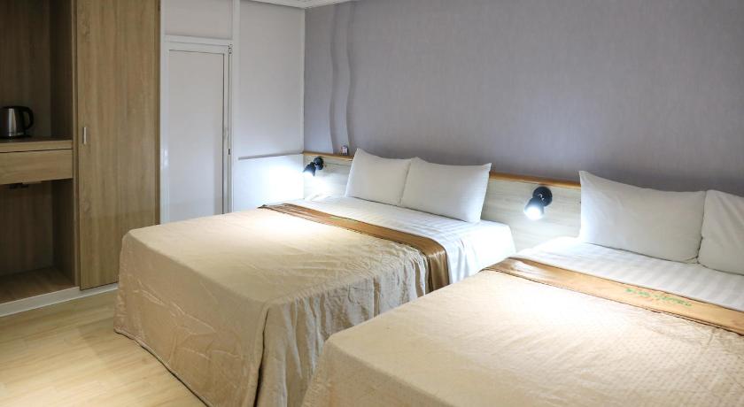 Image of Quadruple Room with Private Bathroom (Check-in after 18:00) 1