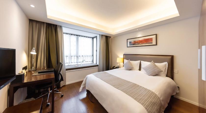 Фото: Номер Премьер с 2 спальнями (2 Bedroom Premier) 5