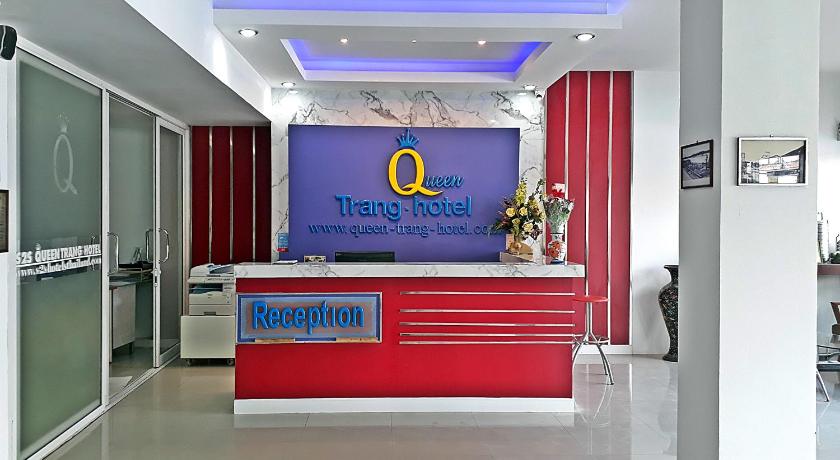 a room with a television and a clock on the wall, S2S Queen Trang Hotel in Trang