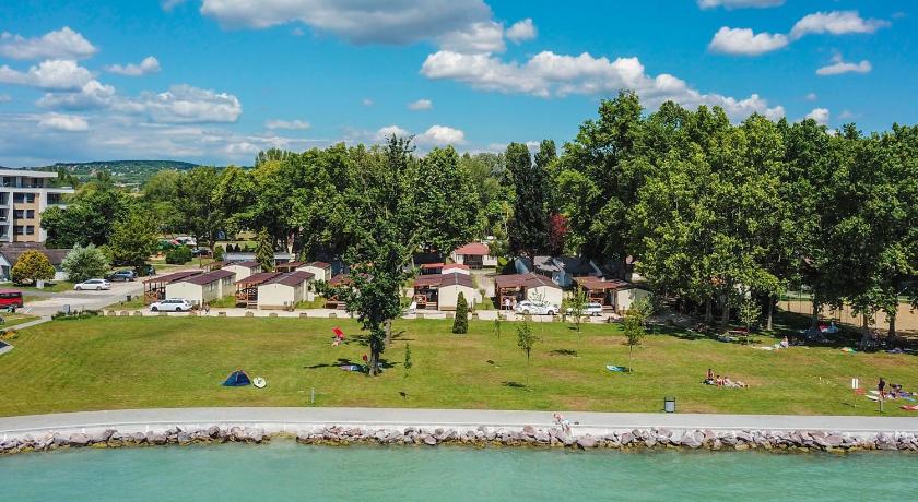 a park with a pool and trees, Happy Camp mobile homes in BalatonTourist Fured Camping & Bungalows in Balatonfured