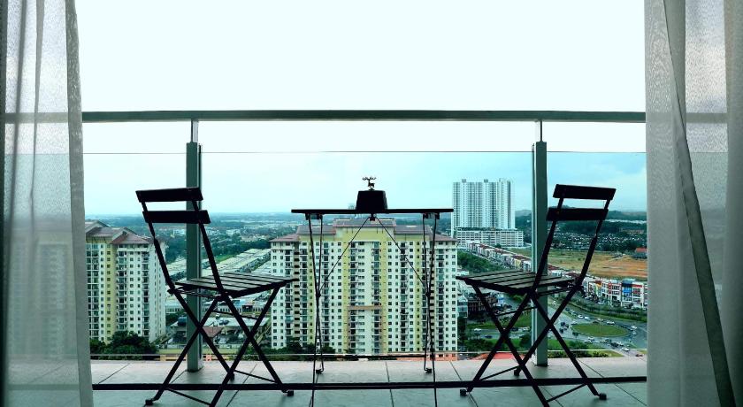 two chairs sitting in front of a window with a view of a city, Viva Homestay @ JB Mount Austin [IKEA, AEON, Toppen, Bubble Tea Town] in Johor Bahru