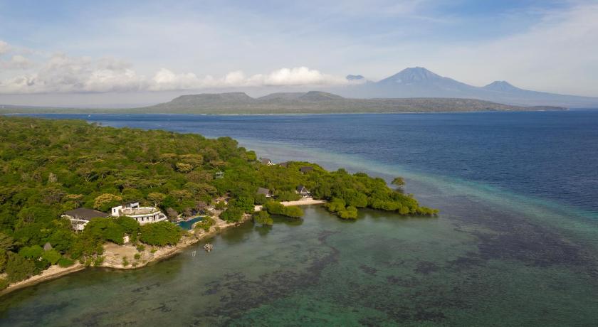 a scenic view of a beach with a large body of water, Plataran Menjangan Resort and Spa in Bali