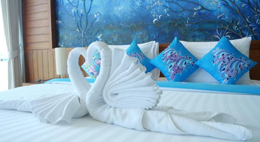 รูปของห้องเตียงใหญ่พร้อมระเบียงและวิวทะเล (Double Room with Balcony and Sea View) 8